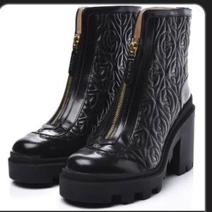 Gucci 
Black leather authentic boots
